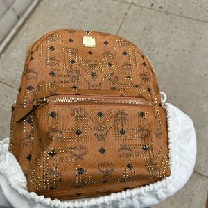 Limited edition MCM studded backpack size medium in visetos